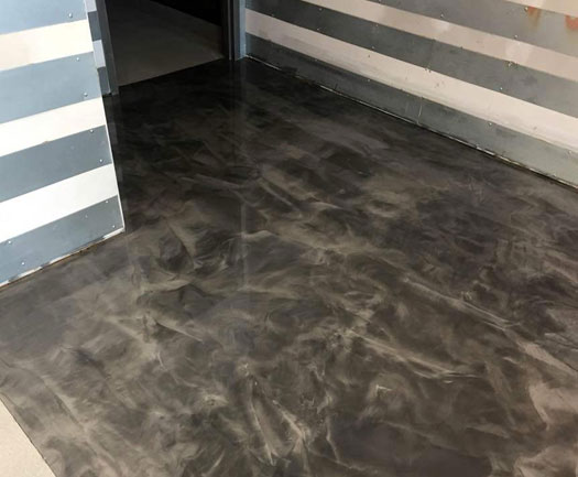 An Epoxy Floor is being applied to this floor.
