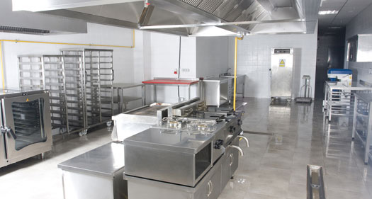 The image shows a food manufacturing industrial space.