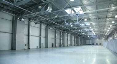 Commercial Polished Concrete The image shows an industrial space.