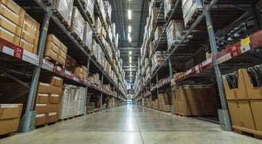 Polished Concrete Contractors The image shows an industrial space.