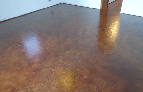 This image shows a room with brown epoxy flooring floor.