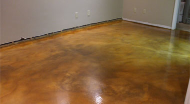 An Epoxy Floor is being applied to this Basement floor.