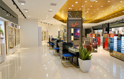 The image shows stores inside a mall.