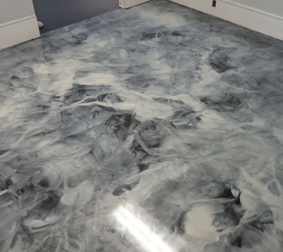 A metallic Epoxy Floor is being applied to this floor.